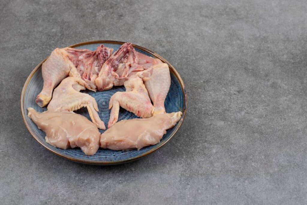 piece of chicken in plate.